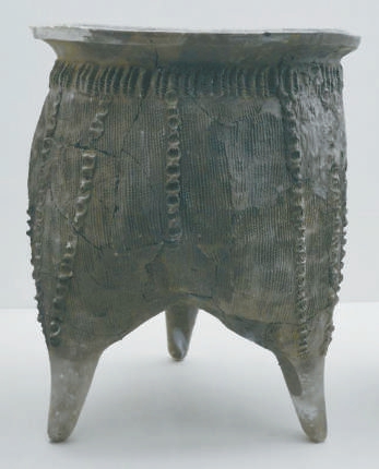 陶鬲是商代流行的一种炊器，这件灰陶鬲出土于郑州商城遗址。党春辉摄于河南郑州市博物馆